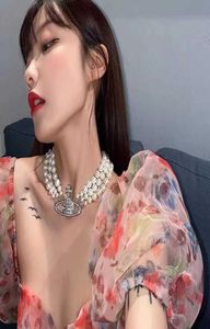 Western Empress Dowager enne Lumière Luxury minoritaire Saturn Collier Perle Collier à trois couches Femme6166048