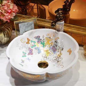Blanc Chine Artistique Papillon à la main Céramique Lavobo fleur Comptoir à la main en céramique petit lavabo salle de bains lavabosbonne quantité Eibmf