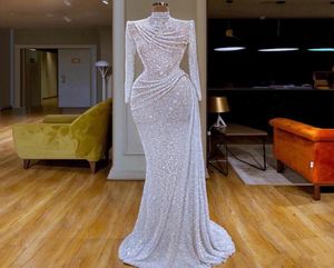 Witte glitter lovertjes Mermaid avondjurken Hoge nek Ruched Vestidos de Fiesta Custom Made Long Sleeve Prom -jurk formeel LJ2015083537