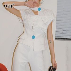 Blanc Patchwork Bowknot Chemises asymétriques pour femmes Col V Sans manches Ruché Slim Blouses Femme Summer Fashion Style 210531