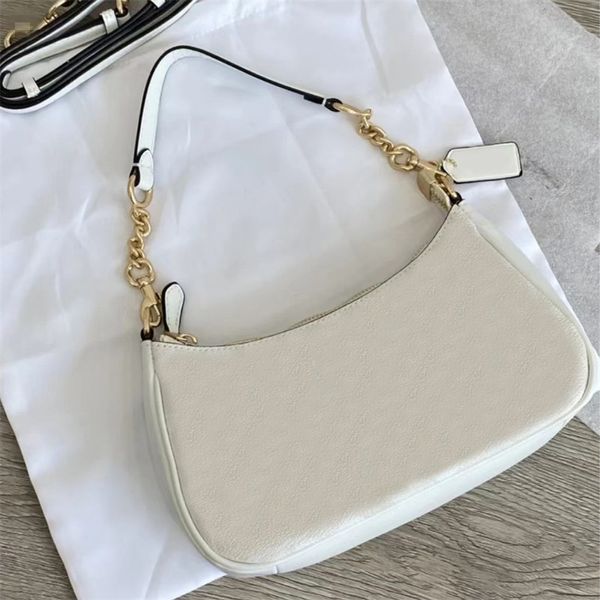 Pochette blanche en cuir sac à bandoulière sacs de créateurs de luxe sacs à main sous les bras mode sacoche classique casaul femme sac à main lettre complète avec petit pendentif xb069