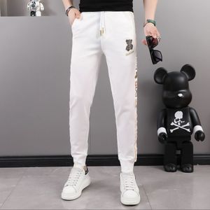 Pantalons de survêtement blancs hommes pantalons décontractés minces 2022 été nouvelle marque de mode coupe ajustée mâle séchage rapide pantalon sport pantalons décontractés 28-38