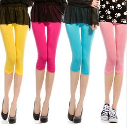 Todo 1 PC 11 colores Nuevo 2016 Estilo de verano Color caramelo Mujeres Leggings recortados 34 Longitud Lady Leggins Pantalones elásticos altos 2220941
