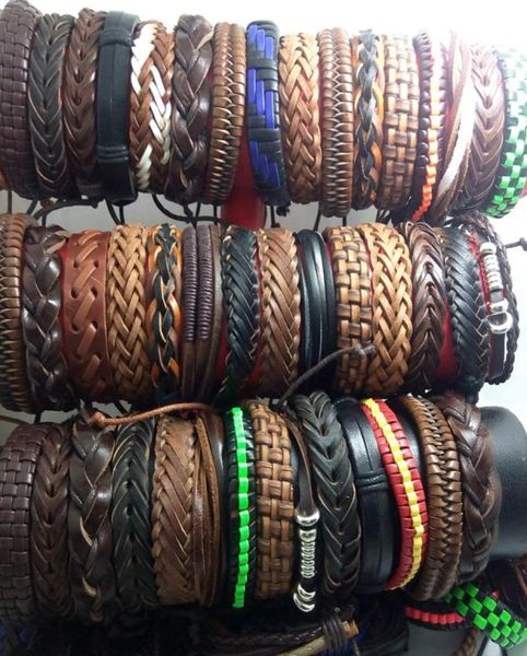 Pulseiras inteiras de couro genuíno para homens e mulheres, 100 peças, vintage, punho de surfista, presente de festa, estilo misto, joias da moda, lote 4532945