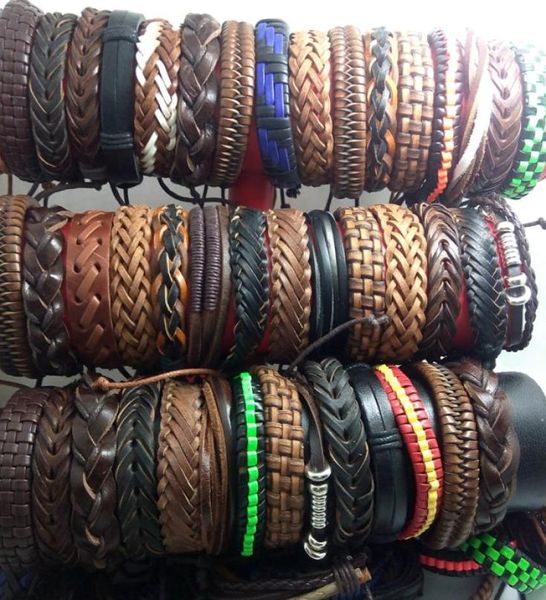 Entier 100 pcs Hommes Femmes Vintage Bracelets En Cuir Véritable Surfeur Bracelets De Manchette Cadeau De Fête Style Mixte Bijoux De Mode Lots8645899