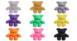 Entier 100pcs PVC Cartoon personnage coloré de chaussures d'ours coloré décorations de créateurs de boucle pour enfants charmes jibbitz bouton 2969553