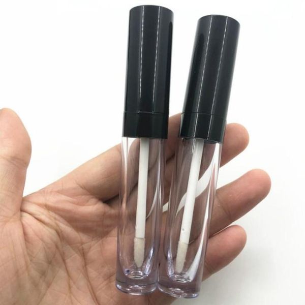 Botella de tubo de brillo de labio negro redondo de 7 ml entero tubos de brillo de labios vacíos con caja y logotipo de plástico Embalaje cosmético Lipblam Lipstick6512208