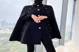 Abrigo de tela de lana de capa negra entera Mujeres poncho otoño invierno mediano longitud vintage cloak outwear botones de moda femenino4817564
