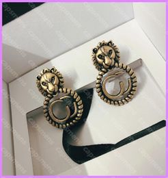 Aro entero Pendientes de oro retro Mujer Calle Moda Pendiente redondo Joyería de diseño de lujo Señoras Pendientes de oreja de animales Letras G Me7147507