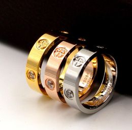 Anillos cruzados de acero de titanio entero anillos de amor de oro rosa amante de plata 039s anillo tornillo boda cz piedras joyería cumpleaños presen8252042