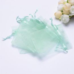 Whole- Whole 9x12CM 100pcs / lot Cordon Tiffany Bleu Organza Sacs Faveur De Mariage Cadeau De Noël Bijoux Emballage Sacs 2514