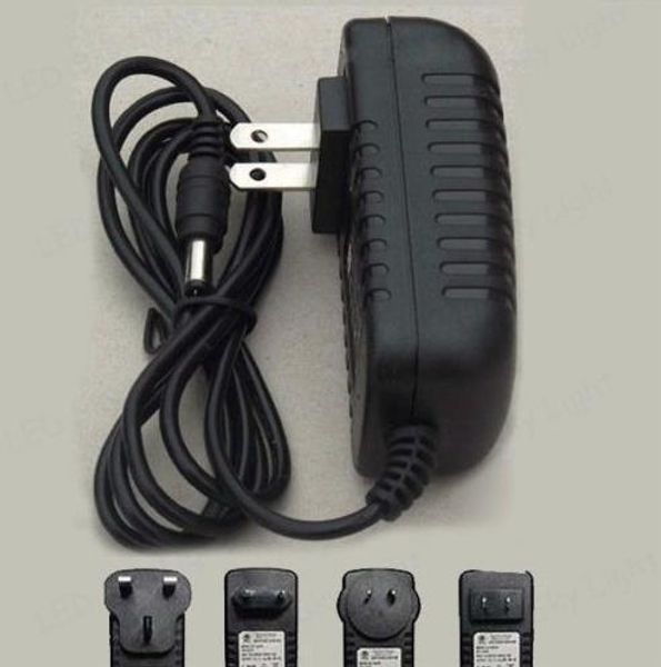 Envío gratuito Venta al por mayor 10 piezas AC 100-240V a DC 12V 2A Adaptador de corriente Cargador para tiras de luz LED Enchufe UE / EE. UU. / AU / Reino Unido 5.5 * 2.1 mm