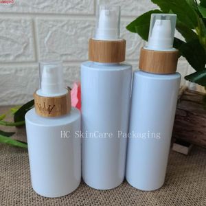Atacado 100 unidades de recipientes de loção de plástico para maquiagem frascos para cosméticos cuidados com a pele frasco de spray com tampa de bambu