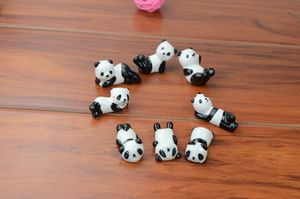 Venta al por mayor-10x Artículos de cerámica Panda Palillo Resto Porcelana Cuchara Tenedor Cuchillo Titular Soporte Lindo Encantador Animal En forma de uso doméstico Cena Fiesta