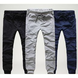 Gros-2016 Hommes Joggers Cargo Unique Pocket Hommes Pantalons à lacets Pantalons de survêtement Sarouel Hommes Jogging Sport Pantalons Hommes Pantalones Hombre