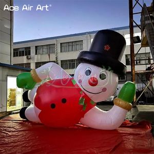 Al por mayor 2023 un muñeco de nieve inflable con iluminación LED grande con abrigo rojo y sombrero de copa para decoraciones de eventos navideños