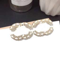 wholesale 20 estilo 18 K chapado en oro plata letras dobles Stud diseñador de lujo pendiente corazón geométrico mujeres cristal perla titanio acero pendientes joyería de la boda