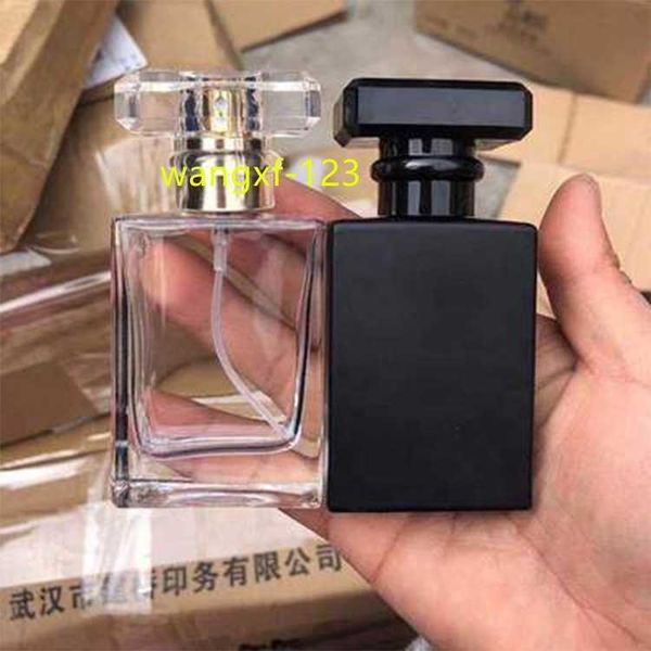Botella de perfume vacía recargable al por mayor del vidrio esmerilado de Flacon del negro claro de 30ml 50ml