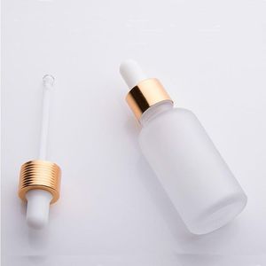 groothandel 30 ml matglazen druppelflesje lege etherische olieflessen serum met gouden strook zwarte dop Aunrm