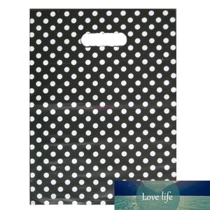 En gros 50 pcs/lot rond points noir en plastique cadeau sac 25x35 cm bijoux Boutique emballage en plastique Shopping avec poignée