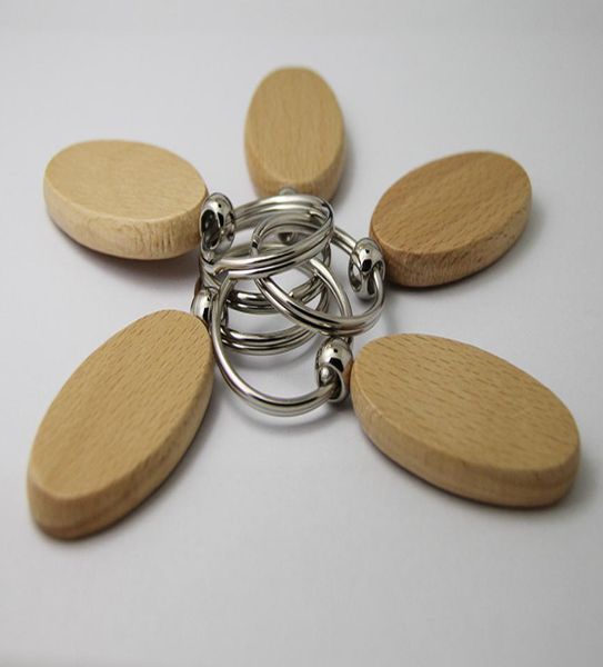 En gros 50pcs OVAL BLAND WOODEN KEY CLAY Promotion Promotion Promotion Promotion de voiture Promotionnel Clé Shipping Shinds Shinds 9295263 Promotion personnalisée