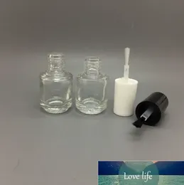 Venta al por mayor, botella de esmalte de uñas de vidrio transparente vacía recargable de forma redonda de 5ml para arte de uñas con cepillo, tapa negra, salida de fábrica