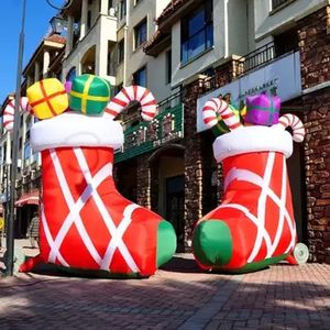 wholesale Media navideña inflable gigante de 6 m 20 para decoración al aire libre Exhibición de regalo explosiva para uso en eventos festivos