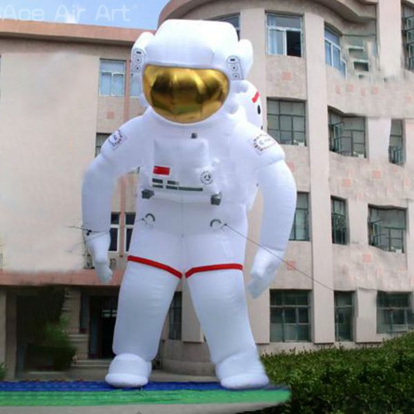 wholesale El modelo de personaje de astronauta inflable doblado con logotipo de hombro de 8 m H y 26 pies de alto se puede personalizar con un soplador de aire para eventos en oferta