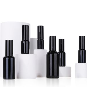 Venta al por mayor de botellas de spray de vidrio negro 5ml 10ml 15ml 20ml 30ml 50ml 100ml Envases de embalaje de cosméticos vacíos con tapa de rociador de bomba