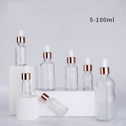 Gros flacons compte-gouttes en verre de sérum clair 5 ml 10 ml 15 ml 20 ml 30 ml 50 ml 100 ml avec couvercle en or rose pour huiles essentielles