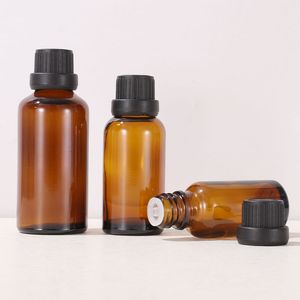 Bouteilles compte-gouttes d'emballage d'huile essentielle cosmétique en gros 5 ml 10 ml 15 ml 20 ml 30 ml 50 ml 100 ml avec bouchon en plastique et couvercle inviolable noir