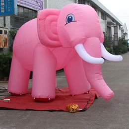 wholesale Grand éléphant gonflable de forme personnalisée / 5 ml (16,5 pieds) avec mascotte animale de zoo d'éléphant rose géant de ventilateur pour la décoration d'événements