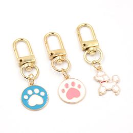 Groothandel honden poot print hanger Keychain mode sleutel ringen zipper pull charm planner charms accessoires hangbag hangende hangers sleutelen voor vrouwelijke meisjes