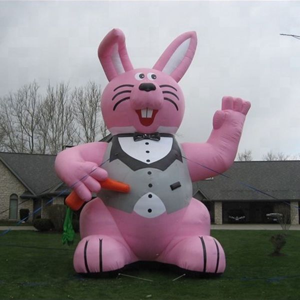 Venta al por mayor Globo inflable de conejo rosa gigante de Pascua de 23 pies para publicidad/evento/Pascua/fiesta