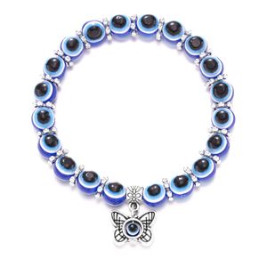 Venta al por mayor de pulseras con dijes de mariposa y tortuga plateadas en plata antigua a la moda, pulsera con cuentas de mal de ojo azul