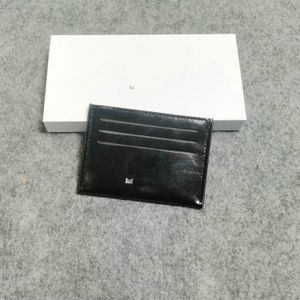 Venta al por mayor Moda Lu Titulares de tarjetas de crédito Mujeres Mini billetera Alta calidad Cuero genuino Hombres Diseñador Color puro Titular de la tarjeta Carteras de doble cara con caja