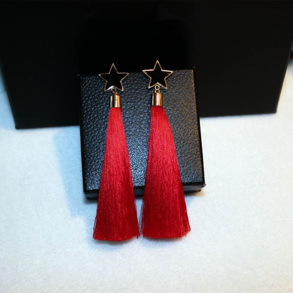 Diseñador de moda al por mayor lindos aretes de borla de estrella encantadora para mujer niñas negro rojo azul