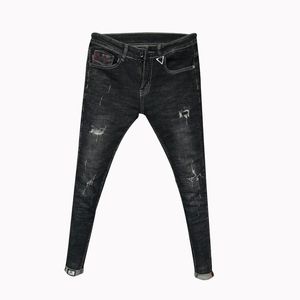 Gros mode pantalons déchiquetés jeans slim pour hommes à la mode coréen denim social jeunesse pieds pantalons cheveux styliste crayon pantalon 201111