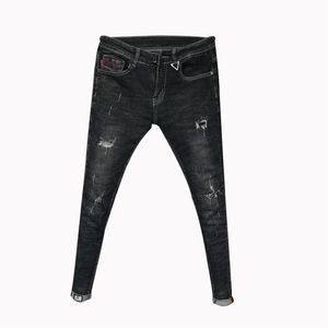 Mode en gros pantalons déchiquetés jeans slim pour hommes à la mode coréen Denim jeunesse sociale pieds cheveux styliste crayon 211108