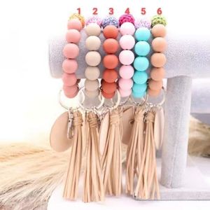 Groothandel buitenlandse handel food grade siliconen kralen armband sleutelhanger blanco schijf sleutelhanger vrouwelijke multi-color optioneel