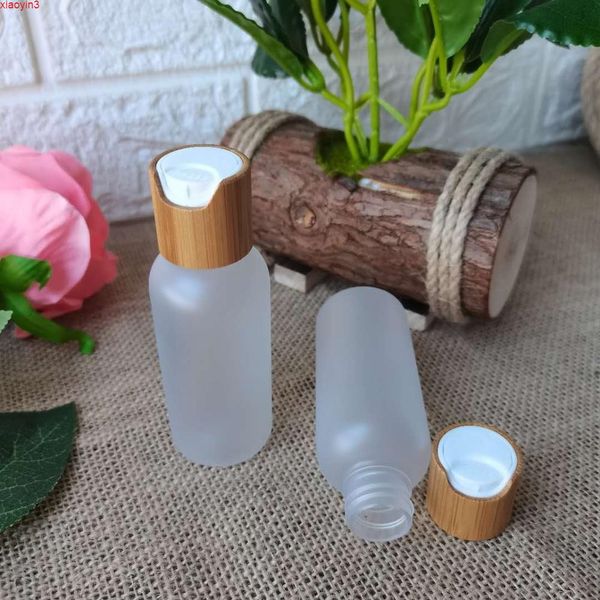 Venta al por mayor de botellas de tóner de plástico transparente esmerilado para el cuidado de la piel, envases cosméticos, envases de 8 oz con tapa de bambú, botellas de aerosol de Perfume