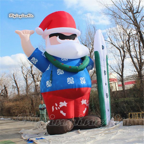 wholesale Modelo de Papá Noel inflable de surf gigante Publicidad Globo de Papá Noel soplado por aire que sostiene una tabla de surf para decoración navideña al aire libre