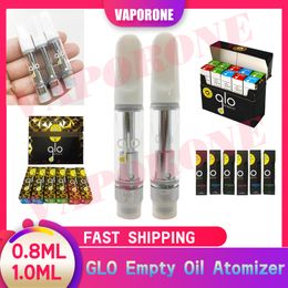 Vente en gros GLO 0,8 ml 1,0 ml Chariots jetables Bobine en céramique avec extraits d'emballage Dab Pen Vaporisateur de cire 510 Fil Cartouches d'atomiseur d'huile vides Authentiques