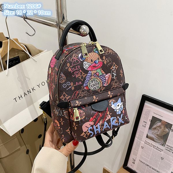 Bolso de hombro de damas al por mayor 3 colores dulces y lindos pequeños bolsos de moda de moda engrosado mochila impresa mochila de ocio al aire libre resistente al aire libre 1206#