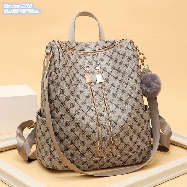 wholesale dames sacs à bandoulière 2 couleurs grande capacité anti-vol double fermeture éclair sac à dos de voyage douce boule de fourrure pendentif mode sac à main tendance contraste sac en cuir