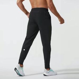 Vente en gros LL Mens Jogger Pantalons longs Sport Yoga Outfit Séchage rapide Cordon de serrage Poches de sport Pantalons de survêtement Pantalons Hommes Casual Taille élastique fitness