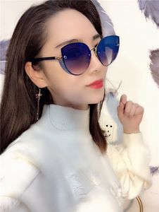Femmes de créateurs de gros-luxe DANB S Lunettes de soleil charmantes Oeil de chat Pentagram lunettes métal flash perles design galsses 100% protection UV400