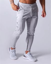 Al por mayor-MarchWind Designer Jogging Pants Hombres Sport Sweatpants Running Men Joggers Cotton Trackpants Slim Fit Pantalones Bodybuilding Trouser