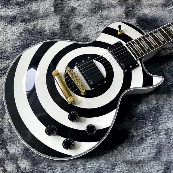Zakk Wylde bullseye – guitare électrique blanche et noire, micros EMG 8185, couvercle de tige en treillis doré, bloc de vadrouille blanc, incrustation de touche