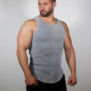 Venta al por mayor-Nueva marca Hot Fad Men's Plain Tank Top Muscle Cami Camisetas sin mangas Tops Casual Solid O Neck Tops